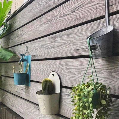 Un buen precio. Decking exterior 3D compuesto de tres capas de perfil de cubierta hueco de WPC en línea